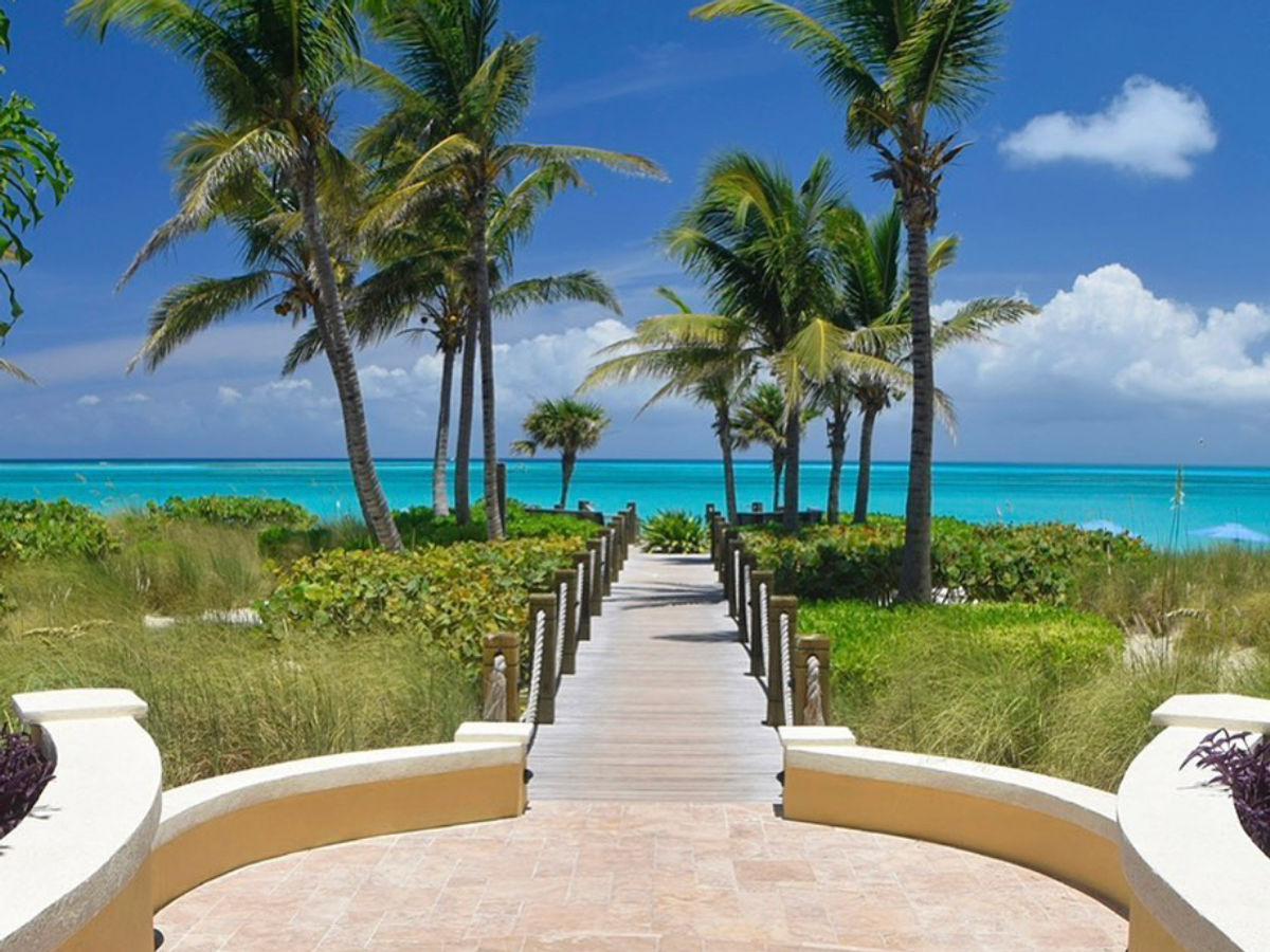 Airplane wing above clouds